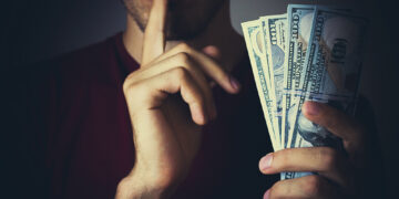 What is the meaning of blackmail and buttock mail?